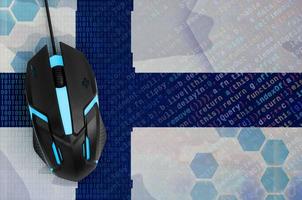 Finland flag  and computer mouse. Digital threat, illegal actions on the Internet photo