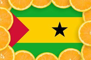 Sao Tome and Principe flag  in fresh citrus fruit slices frame photo