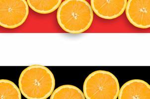 Yemen flag  in citrus fruit slices horizontal frame photo