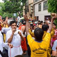 New Delhi, India July 01 2022 - A huge gathering of devotees from different parts of Delhi on the occasion of ratha yatra or rathyatra. Rath for Lord Jagannath pulled by people, Jagannath Rath Yatra photo