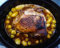 Roast turkey with Brussels sprouts potatoes and gravy photo