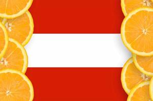 Austria flag  in citrus fruit slices vertical frame photo