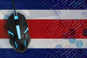 Costa Rica flag  and computer mouse. Digital threat, illegal actions on the Internet photo