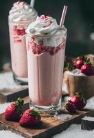 3d illustration of milkshakes. Cream, topping, chocolate, vanilla, fruits, banana, strawberry, cookies, biscuit. Advertisement, banner. Festive, winter, autumn, Christmas. photo