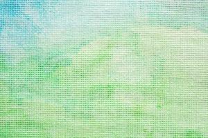 Abstract green and blue watercolor paint background texture close up photo