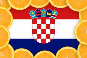 Croatia flag  in fresh citrus fruit slices frame photo