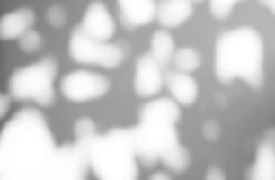 Bokeh sunlight natural shadow overlay on white texture background, for overlay on product presentation, backdrop and mockup photo
