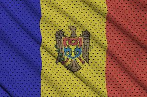 Moldova flag printed on a polyester nylon sportswear mesh fabric photo