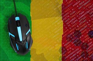 Mali flag  and computer mouse. Digital threat, illegal actions on the Internet photo