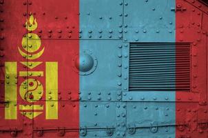 Mongolia flag depicted on side part of military armored tank closeup. Army forces conceptual background photo