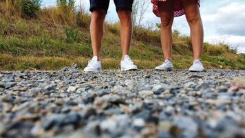 Couple on the road, legs photo 2