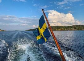 Swedish flag on a sailing boat 3 photo