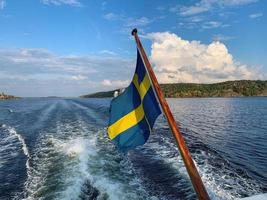 Swedish flag on a sailing boat 4 photo