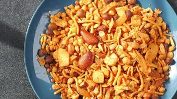 Savory snack mix with roasted nuts and corn chips video