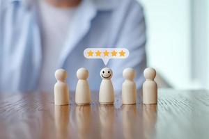 Figure with happy face and 5 star on speech bubble. Feedback rating and service review. Customer experience, Mental health assessment, World mental health day,Think positive, Emotion, Satisfaction. photo