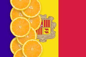 Andorra flag and citrus fruit slices vertical row photo
