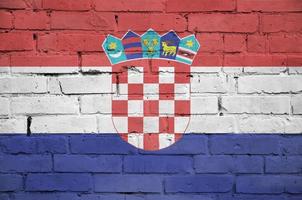 Croatia flag is painted onto an old brick wall photo