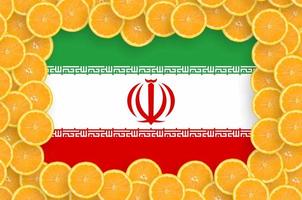 Iran flag  in fresh citrus fruit slices frame photo