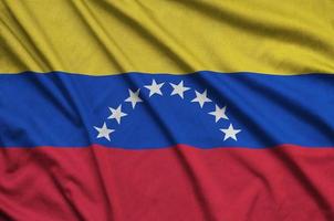 la bandera de venezuela está representada en una tela deportiva con muchos pliegues. bandera del equipo deportivo foto