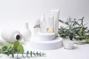 moisturizing cream bottle over leaf background studio, packing and skincare beauty concept photo