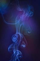 Smoky clouds on dark ground photo