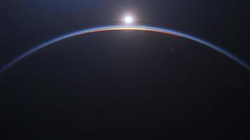Dawn, the sun rises behind the planet earth. Sunrise over the globe. Top view from the space. Day to night transition, great for the news or climatic change concept. Spacescape background in 4k video