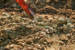 A jackhammer is working, a close-up of a drilling equipment builder. photo