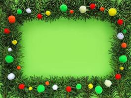 Christmas green frame made of fir tree branches around on light green background, space for text in the center. Border decorated colorful pom poms. Happy holiday Xmas and New Year concept. photo