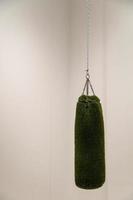 sack or boxing bag, lined with synthetic grass, hung with a chain, box sport, mexico photo