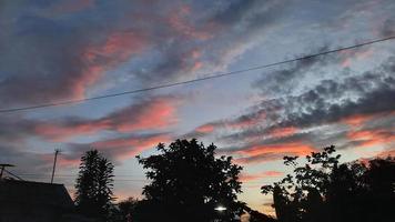 Evening sky background with pink clouds 02 photo