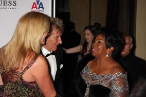 LOS ANGELES, OCT 23 - Penny Lancaster, Rod Stewart, Gladys Knight arrives at the 2010 Carousel of Hope Ball at Beverly HIlton Hotel on October 23, 2010 in Beverly Hills, CA photo