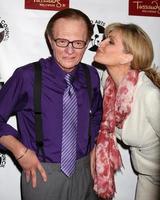 LOS ANGELES, MAR 25 - Larry King Wax figure Purple shirt , Shawn Southwick King arriving at the Charlie Awards at Hollywood Roosevelt Hotel on March 25, 2011 in Los Angeles, CA photo