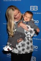 LOS ANGELES, FEB 7 - Jennifer Gareis and son Gavin at the 6000th Show Celebration at The Bold and The Beautiful at CBS Television City on February 7, 2011 in Los Angeles, CA photo