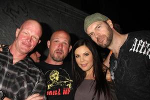 LOS ANGELES, SEP 15 - Derek Mears, GUest, Christa Campbell, Tyler Mane at the Chillerama Premiere at Hollywood Forever Cemetary on September 15, 2011 in Los Angeles, CA photo