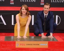 LOS ANGELES, DEC 7 - Emma Stone, Ryan Gosling at the Emma Stone and Ryan Gosling Hand and Foot Print Ceremony at TCL Chinese Theater on December 7, 2016 in Los Angeles, CA photo