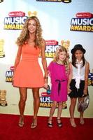 LOS ANGELES, APR 27 - Denise Richards, daughter Lola, friend arrives at the Radio Disney Music Awards 2013 at the Nokia Theater on April 27, 2013 in Los Angeles, CA photo