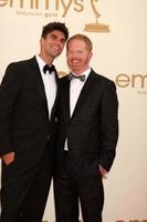 LOS ANGELES, SEP 18 - Jesse Tyler Ferguson, Justin Mikita arriving at the 63rd Primetime Emmy Awards at Nokia Theater on September 18, 2011 in Los Angeles, CA photo