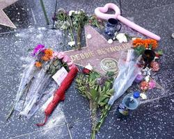 LOS ANGELES, DEC 30 - Fan tributes and official Walk of Fame memorial wreath laid on Debbie Reynolds Star on the Hollywood Walk of Fame on December 30, 2016 in Los Angeles, CA photo