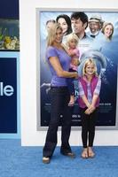 LOS ANGELES, SEP 17 - Gabrielle Reece, daughters arrives at the Warner Bros World Premiere of Dolphin Tale at The Regency Village Theater on September 17, 2011 in Westwood, CA photo