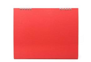 red blank desktop calendar with isolated on white background photo