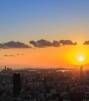 Sunset cityscape business downtown aerial view in Osaka, Japan photo