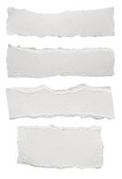 White ripped paper torn edges strips isolated on white background photo