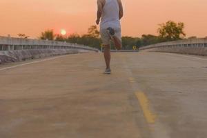 man with runner on the street be running for exercise. photo