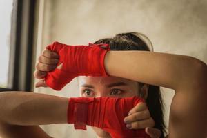 Young and beautiful female boxer photo