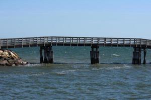 Long Wooden Foot Bridge Over the Atlantic Ocean photo