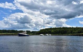 Boats Anchored in a Tidal River in New England photo