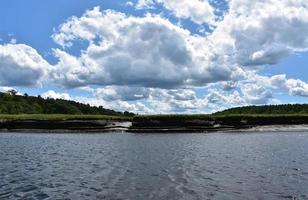 Tidewater Landscape with a River and a Marsh photo