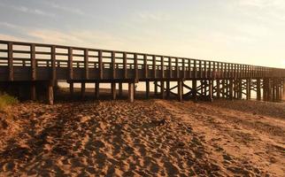 Beach, Bay and Pier Views of Wooden Pier photo