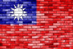 Taiwan flag or Taiwan banner on brick wall texture. photo