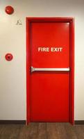 Emergency fire exit door. Red Color metal material. photo